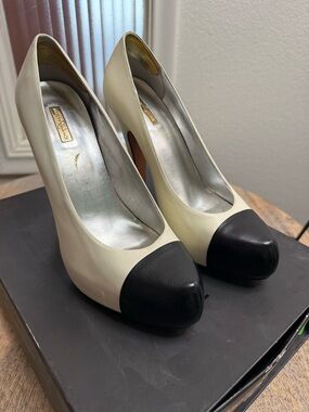 Report Signature Ivory Pumps with Black Cap Toe